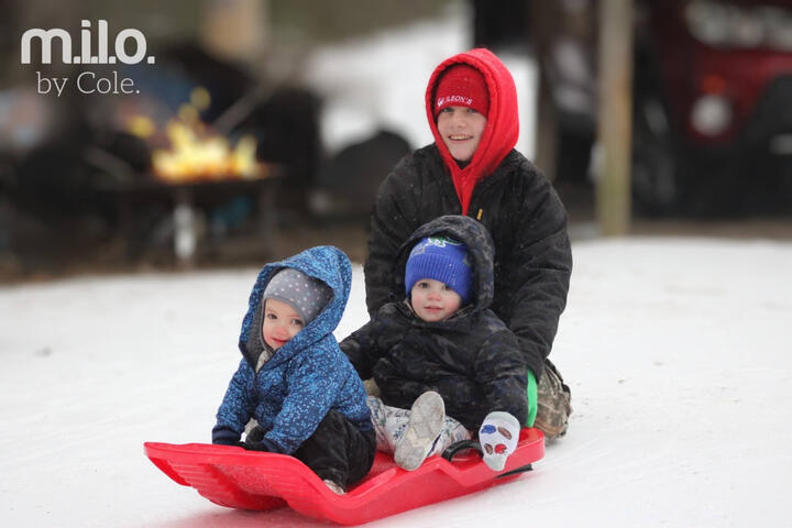 Sibling sledding fun